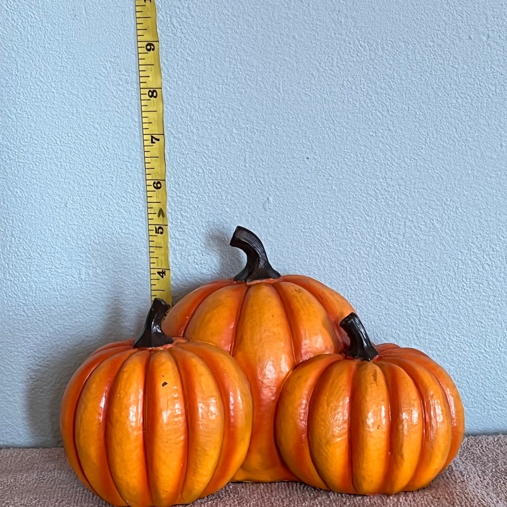 Three small pumpkins